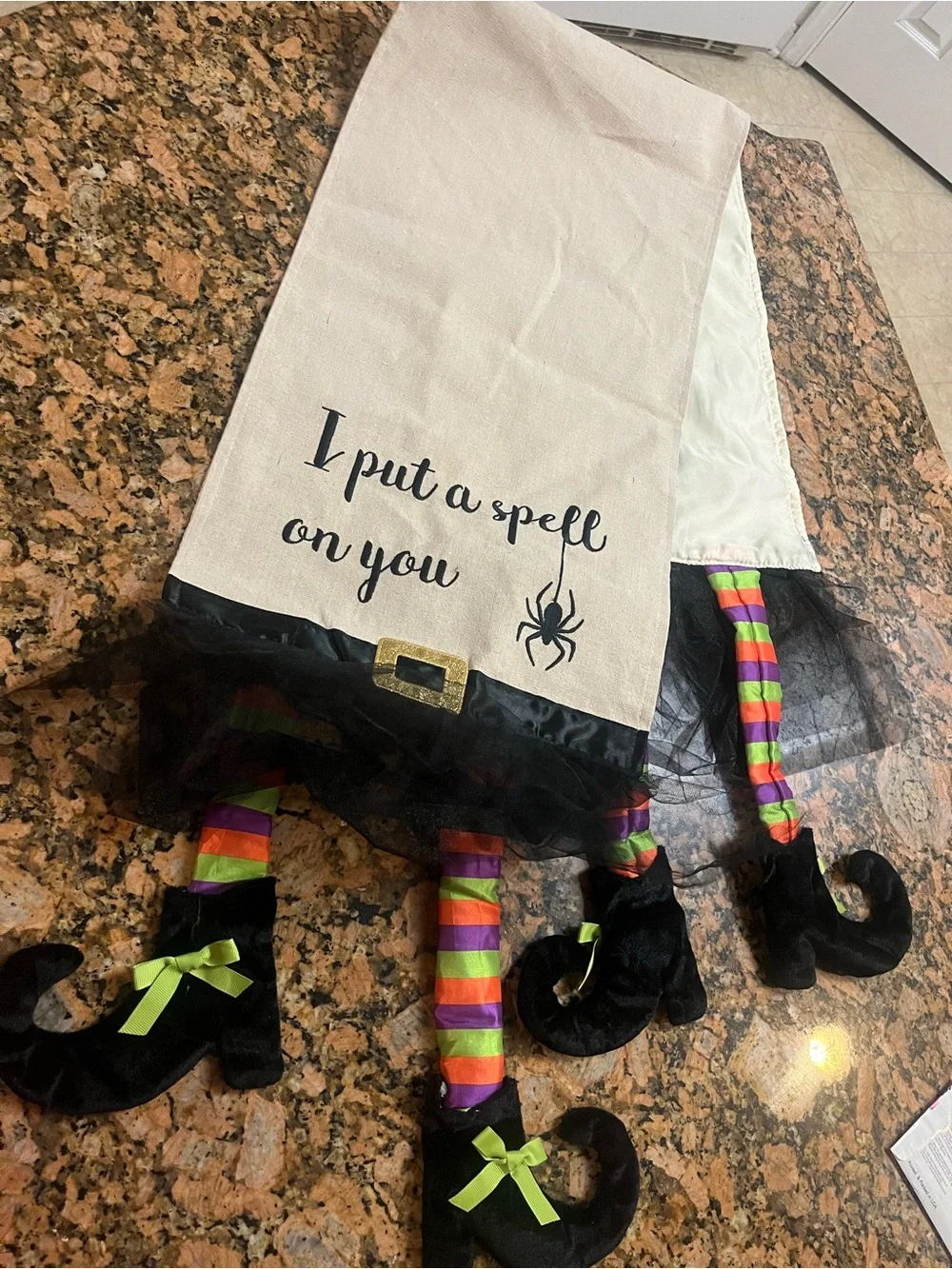 Hocus pocus burlap halloween table runner with 3D witch legs.